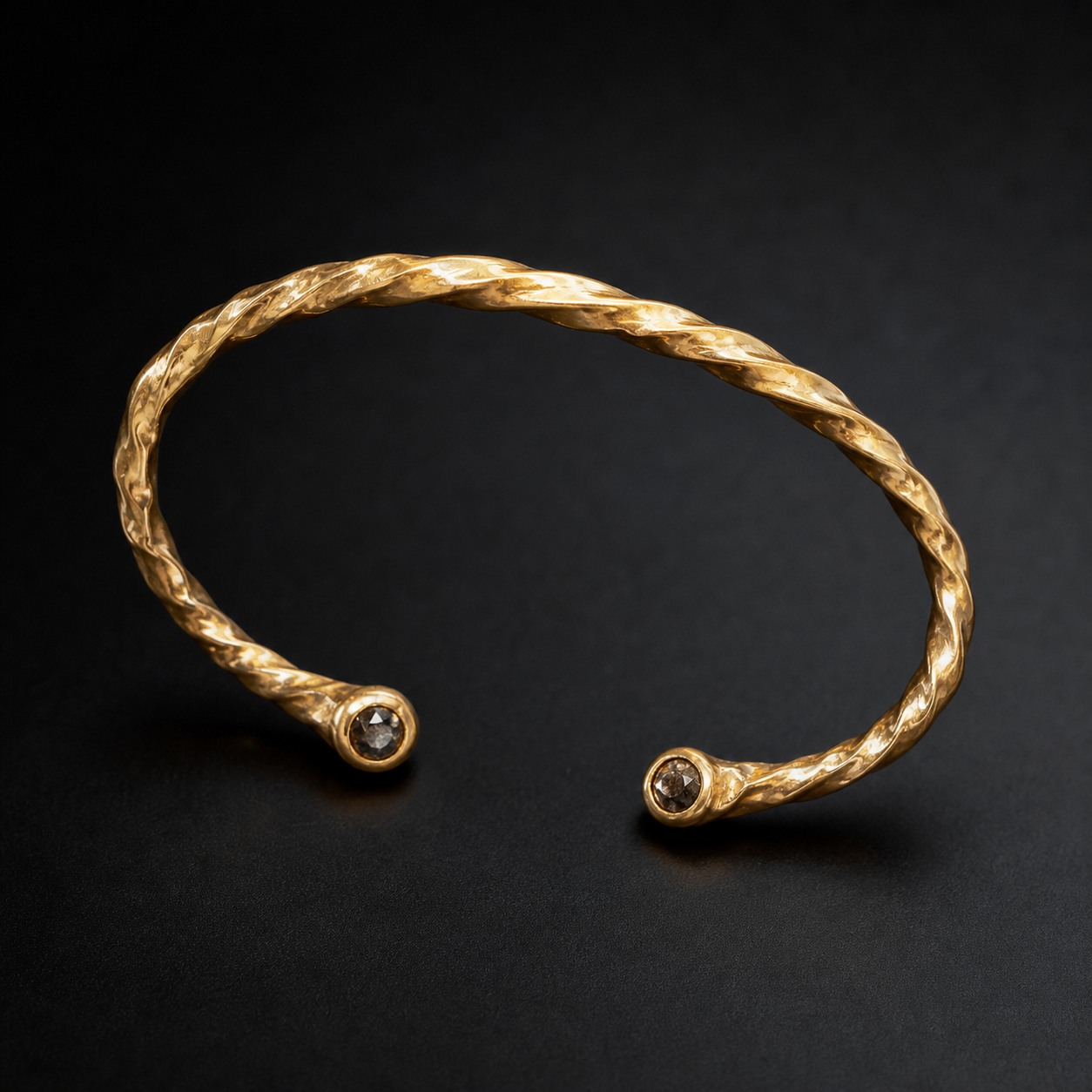 Photograph of a twisted gold cuff bracelet