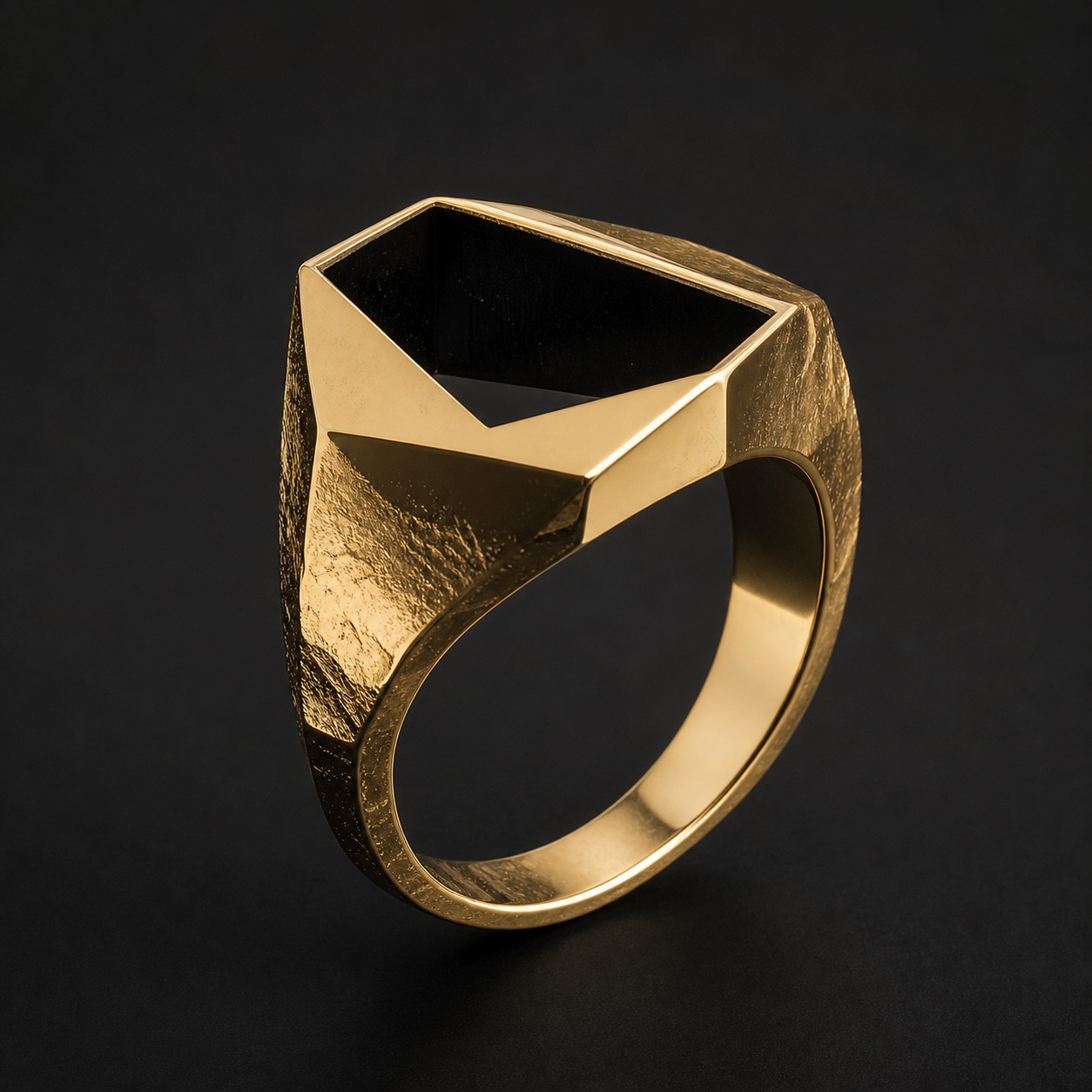Photograph of a sculptural gold ring with a geometric open void